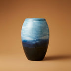 Glanzende urn blauw overloop